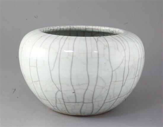 A Chinese crackle glaze alms bowl, Qing dynasty, 16.5cm high, 26.5cm diameter